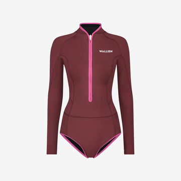 Red Yulex® springsuit wetsuit with pink zip and contour stitching, designed for women's water sports, on white background