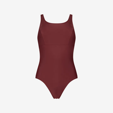Red full coverage swimsuit with square neckline and bust seam support, made for active swim performance, on white background