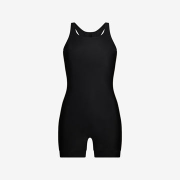 Black one-piece swimsuit with racerback straps and clean seams, designed for women's performance swim, on a white background